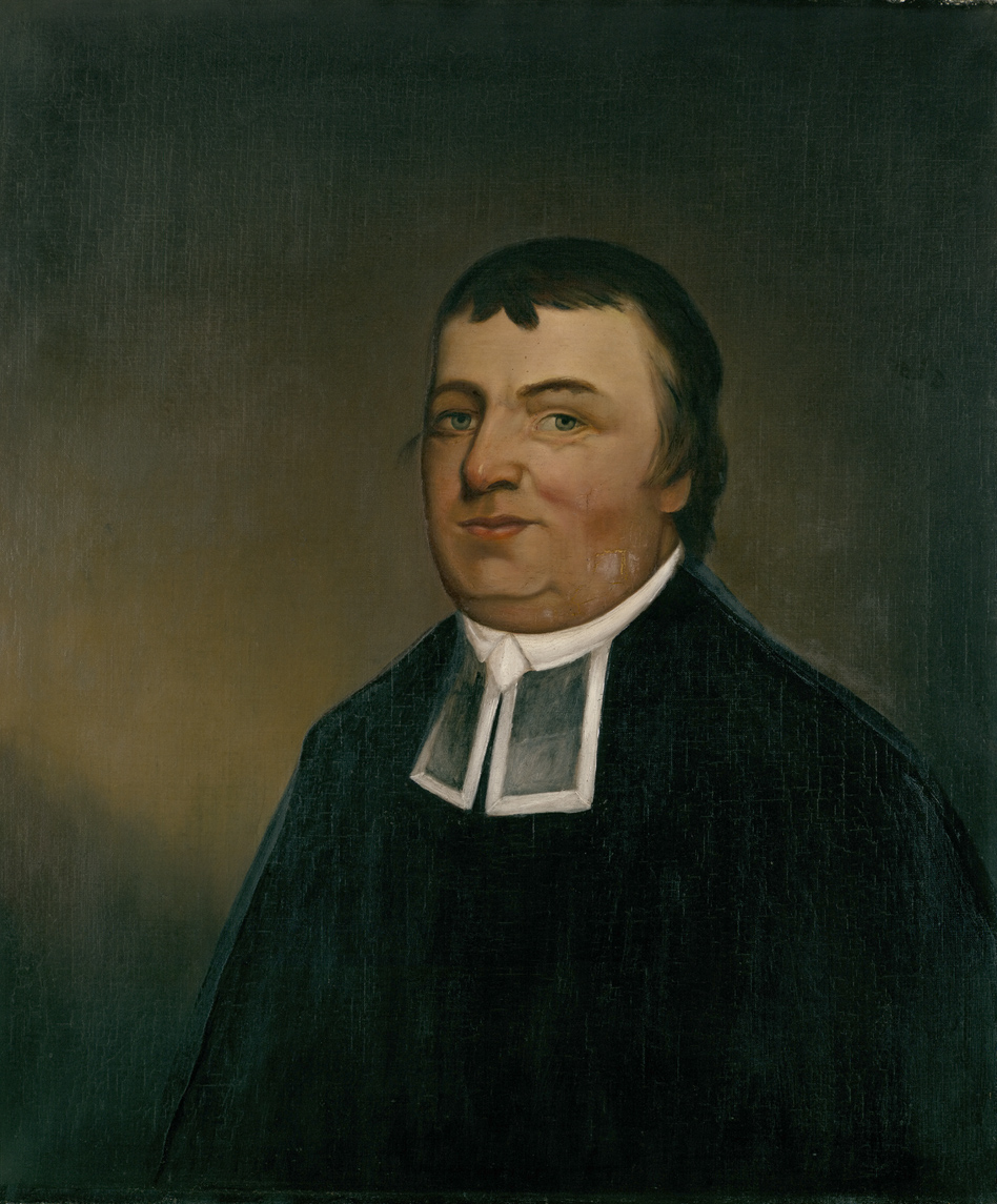 A colored painting of a white man with short brown hair, painted from the waist up. He is wearing a black cloak with a white collar. Two ends of a white necktie hang beneath the white collar.
