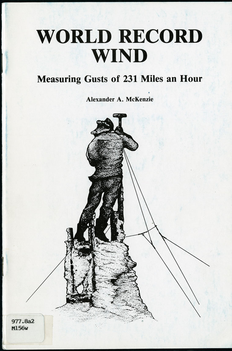 A page shows a black and white drawing of a standing man with his back to the viewer, holding onto a pole. The pole is secured to the base with lines, and has a small rectagular box on top. The man wears winter clothing, and is standing on a narrow tower. The text reads 