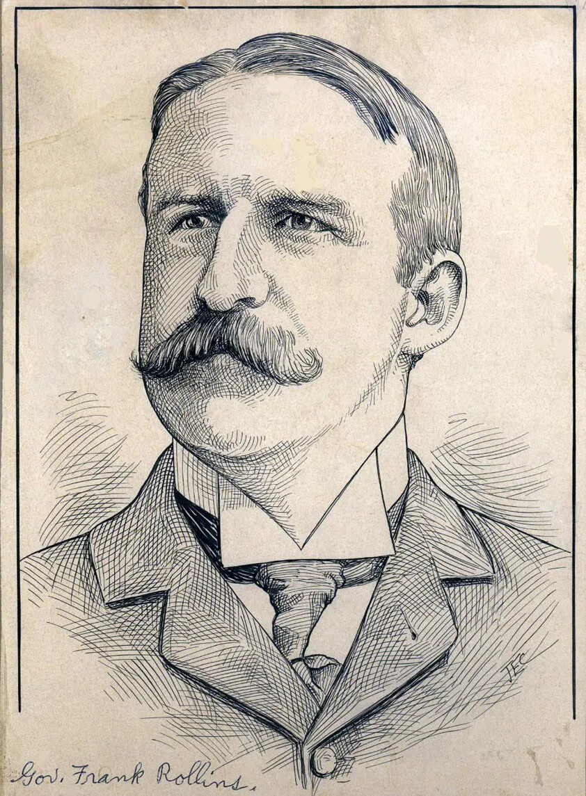 A black and white drawing of a man with short hair and a mustache. He looks off into the distance, to the left of the viewer. He wears a jacket, collared shirt, and a necktie. There is text written in cursive handwriting in the bottom left-hand corner of the drawing, which reads