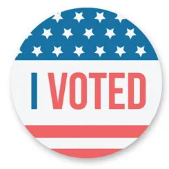 “I Voted” badge with stars and stripes design.