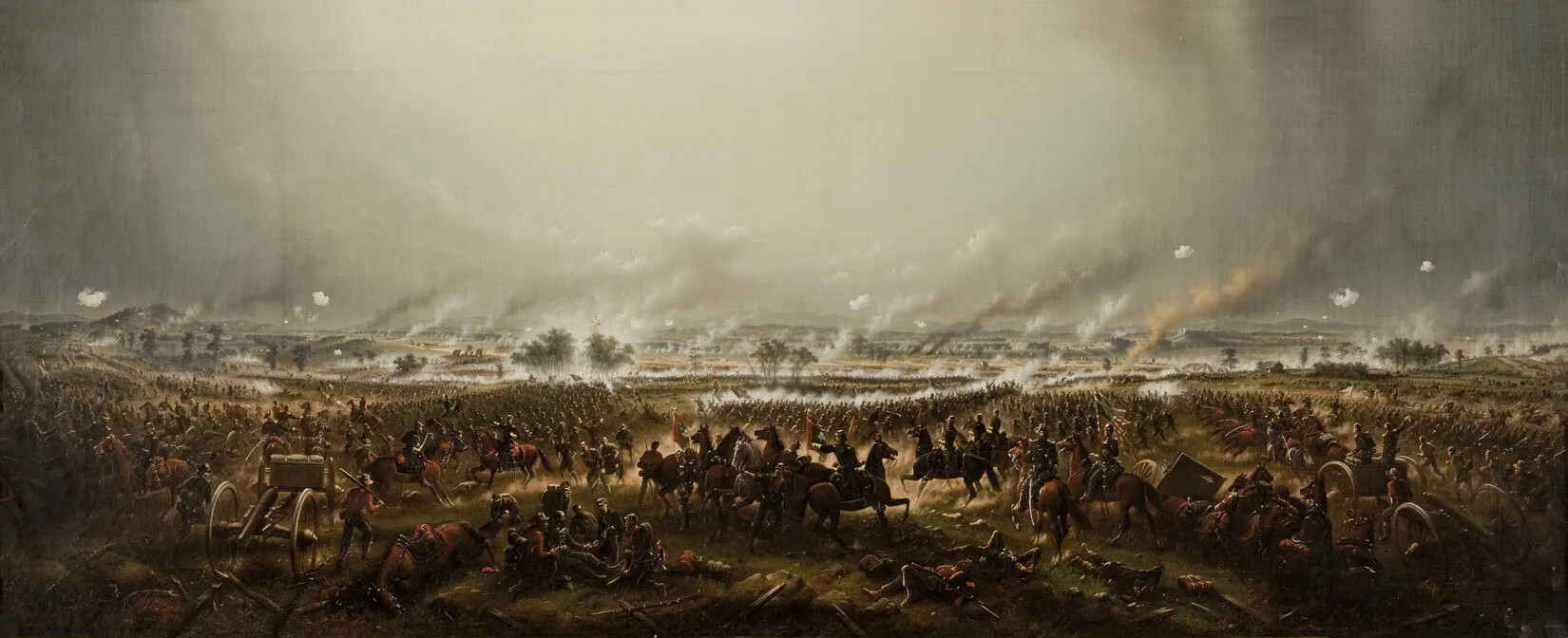 A large, rectangle, color painting of a battle has many details. The sky covers the top half of the painting, and has bright and dark grey parts, but generally is distinguished by the many columns of smoke rising from the battle. The battle covers a large, wide open landscape and the viewer can see far into the distance where the battle ranges. Various details visible include riderless horses, men dead on the ground, Civil War cannons being fired, groups of infantry soldiers fighting at close quarters, men on horseback charging, and battered flags flying.