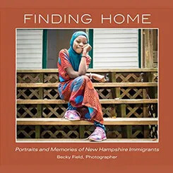 Book cover of "Finding Home: Portraits and Memories of New Hampshire Immigrants" by photographer Becky Field, featuring a young girl in colorful clothing sitting on wooden steps in front of a house.
