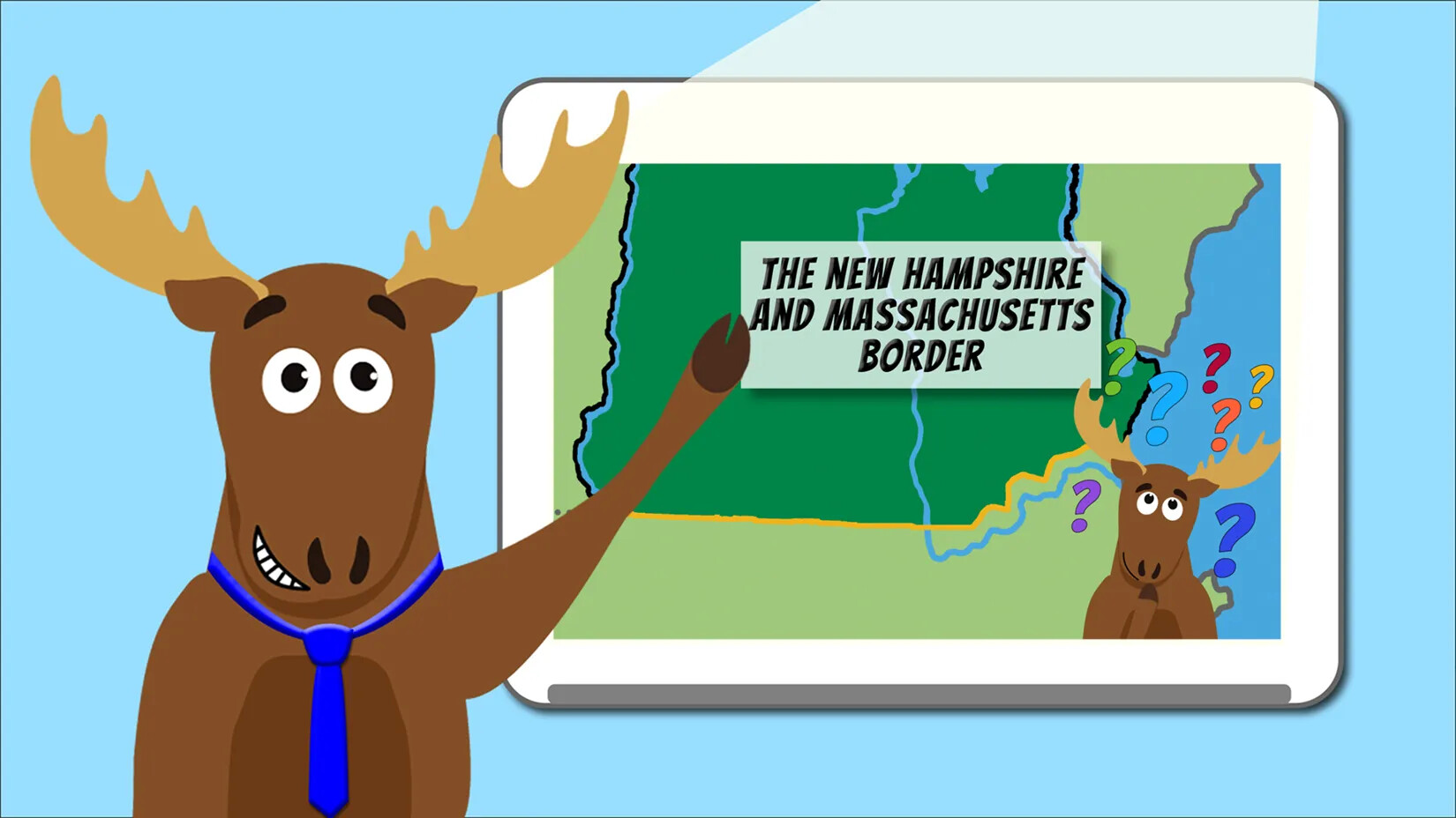 Mason the Moose standing in front of a blackboard