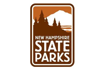 New Hampshire State Parks logo with trees and mountain silhouette.