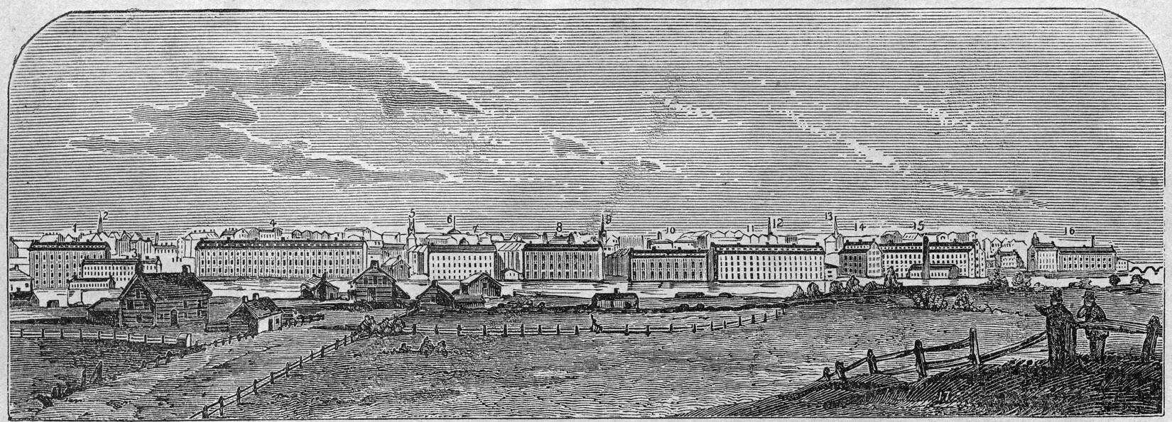 A long rectangular drawing shows a town from a distance. In the foreground, fields bordered by fencing and a few houses line a river. Then in the middle of the drawing, long industrial buildings dominate the town along the river. There are more than nine buildings lining the river across the drawing. Behind the industrial buildings, here and there, other aspects of the town peek through. The sky is shown in the top half of the drawing.