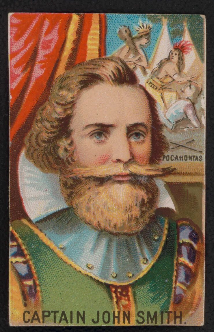 A color drawing of a man shows his head and shoulders. He wears a decorative shirt with gold-threaded sleeves. He has a collar of armor, bordered with gold. His hair is brown and curly, as are his large beard and large, pointed mustache. Behind him on the left is a red curtain. On the right behind him, two figures with feather headdresses and leather-looking clothes are holding a person on her knees and threatening her. Under the person, who wears white, is the word "POCAHONTAS." At the bottom of the painting, it reads "CAPTAIN JOHN SMITH."
